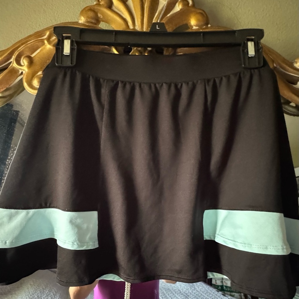 Tail Black Skirt with Blue Accents